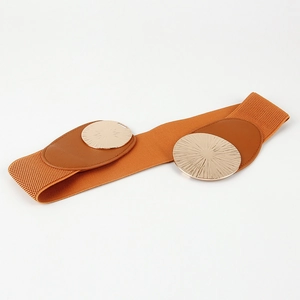 Detail of a brown elastic belt featuring dual golden circular metal buckles and leather trim