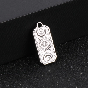Silver stainless steel rectangular pendant with evil eye and crescent moon celestial patterns