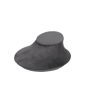 Close-up of premium dark grey velvet finish on a necklace bust display stand