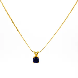 Gold twisted rope chain necklace with a round deep blue birthstone pendant in 4-prong setting