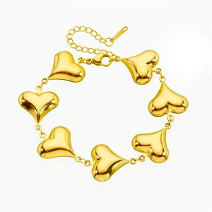 Adjustable golden stainless steel link bracelet featuring stylish heart-shaped metal charms