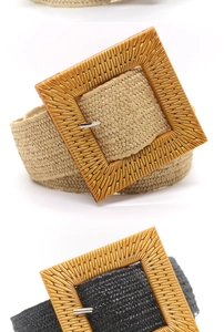 Detail of woven straw-style waist belts with large square buckles in beige and black