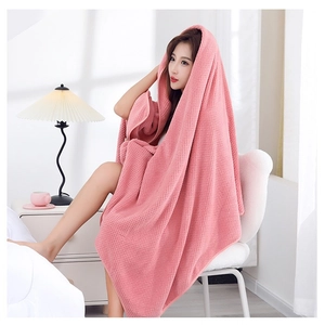 Pink coral fleece bath towel with waffle texture and extra large absorbent design