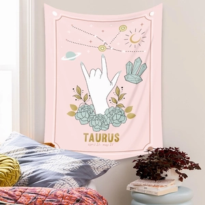 Close-up detail of Taurus astrology wall tapestry with floral and crystal elements