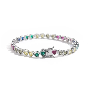 Colorful heart-shaped tennis bracelet with vibrant crystals in a polished silver setting