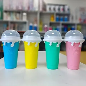 Detailed set of four 500ml Frozen Magic squeeze slushy cups in blue, yellow, green, pink