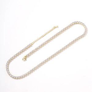 Luxurious gold-plated tennis necklace with full cubic zirconia stones on white background