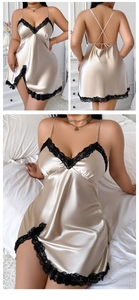 Detail of champagne satin nightgown featuring black lace trim and open back design