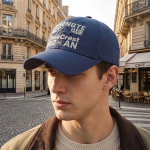 Vintage navy blue cotton baseball cap with Pine Crest embroidery in outdoor setting