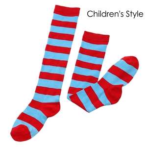 Detailed knit texture of red and blue striped knee-high stockings for children