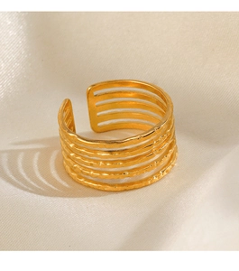Detail of 18K gold plated five-layer adjustable ring with hand-hammered texture