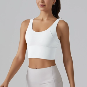 Detail of white V-back sports bra with wide straps and smooth high-elastic fabric