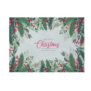 Detail of Christmas table mat showing botanical print and Merry Christmas greeting