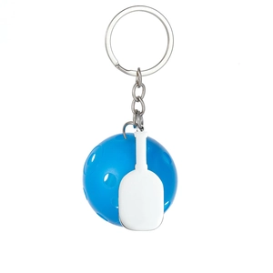 Blue pickleball and silver metal paddle keychain accessory on a clean white background