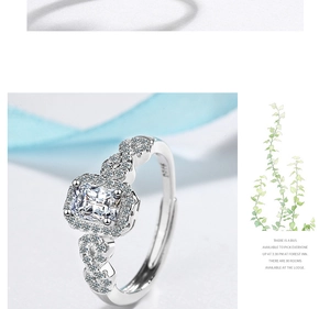 Detail of S925 sterling silver ring with square zircon stone and twisted halo band