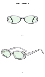 Detail view of oval gray-green translucent sunglasses showing positive and side perspectives