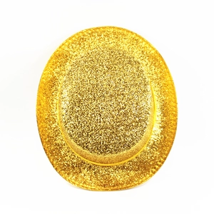 Close-up of sparkling gold sequin top hat with glitter finish for party costumes