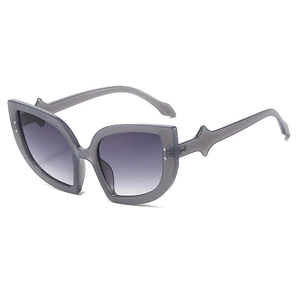 Chic cat eye sunglasses with gray transparent frames and purple gradient lenses