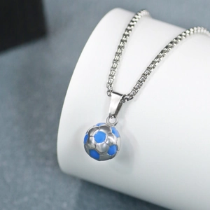 Detailed view of a blue and silver football pendant with a polished silver necklace chain