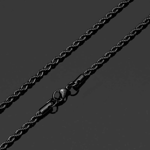 Detail of a black industrial rope chain necklace featuring a durable lobster clasp