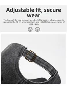 Detail of adjustable metal buckle on washed dark grey cotton baseball cap for a secure fit