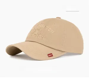 Detail of khaki cotton baseball cap showing 3D MATCH embroidery and red fashion woven label
