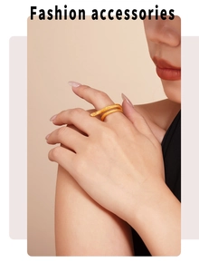 Close-up of double-layered snake ring in 18K gold plated titanium on a finger
