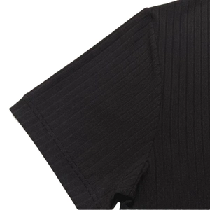 Macro detail of men's black ribbed V-neck T-shirt showing double-needle stitching quality