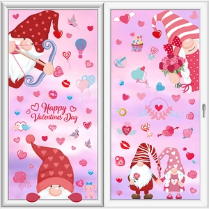 Detail of pink Valentine's Day window clings with gnomes and hearts on glass