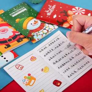 Set di taccuini natalizi tascabili con disegni di Babbo Natale e renne sulla copertina