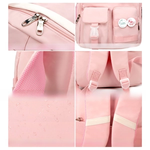 Detail of pink waterproof nylon backpack showing reinforced stitching and zippers