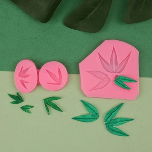 Detailed pink silicone molds for bamboo leaf fondant and chocolate baking decorations