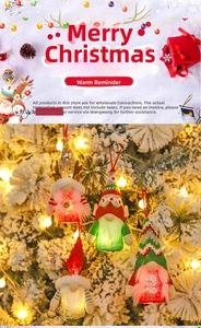 Detail of four glowing Christmas gnome ornaments with LED lights on a festive tree