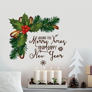 Christmas wall decal with green leaf wreath, red berries, and festive holiday typography
