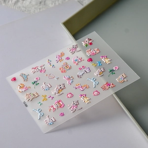 Detail shot of 5D embossed stickers showing TS-068 vintage cat and rabbit patterns
