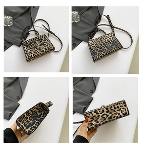 Detail view of leopard print handbag showing front, interior, and bottom silver feet