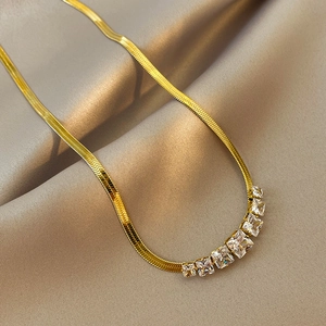 Elegant gold snake chain necklace for women featuring seven graduated square zircons