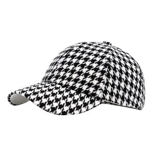 Retro houndstooth baseball cap with curved brim and black and white pattern for sun protection