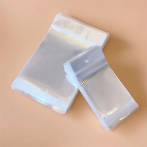 Clear OPP self-sealing plastic jewelry bags with hanging holes for retail packaging