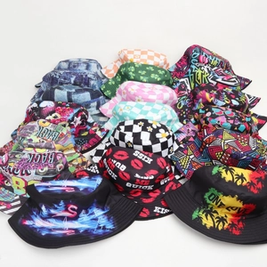 Retro 80s 90s reversible bucket hats with assorted prints like floral and checkered
