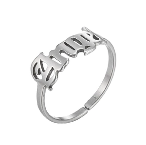 Macro view of gothic GIRL hollowed lettering on adjustable silver open ring band