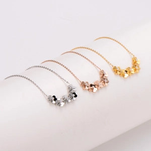 Exquisite 18K gold plated clover necklaces with sparkling cubic zirconia flower pendants