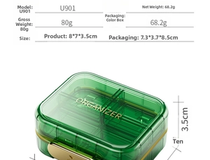 Close-up of green medicine organizer with compartments and gold buckle detail