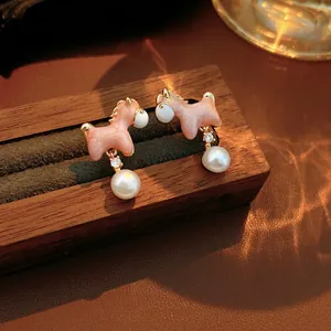 Luxury 18K gold plated pony pearl earrings with pink enamel and sparkling zircon accents