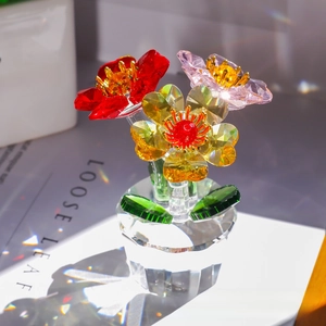 Macro detail of three-color crystal flower ornament with rainbow light refraction