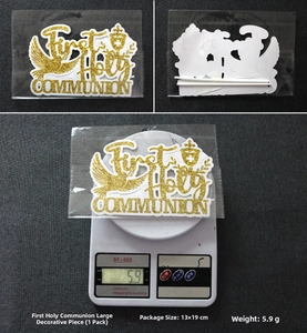Macro view of gold glitter First Holy Communion cake topper with cross and dove motif
