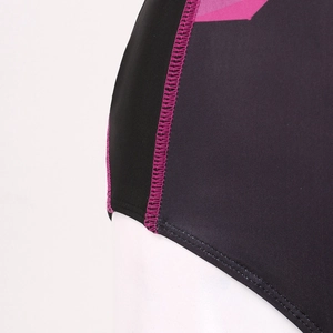 Side view of black athletic one-piece swimsuit with pink flatlock stitching and patterns