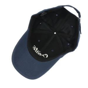 Top view of navy blue cotton baseball cap showing internal structure and metal buckle
