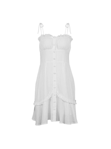 White ruffle mini dress with adjustable straps and button details on clean background