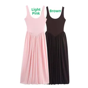 Flat lay of pink and brown pleated maxi dresses with sheer mesh patchwork detail
